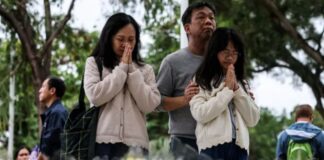 Hong Kong fire death toll rises to 146 as thousands pay respects