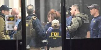 ‘Person of interest’ detained over Brown University shooting, police say